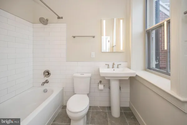 a bathroom with a bathtub