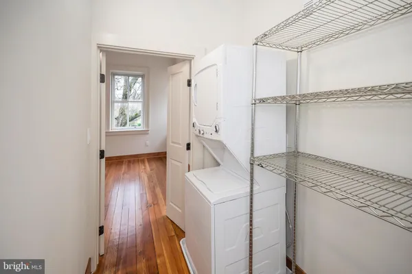 a view of entryway with wooden floor