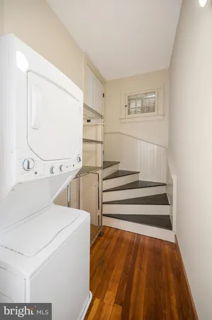 a front view of a house with lots of green space