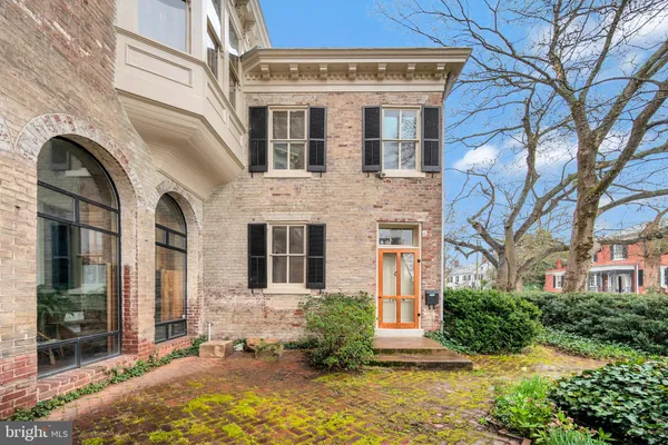 a view of a building with a garden