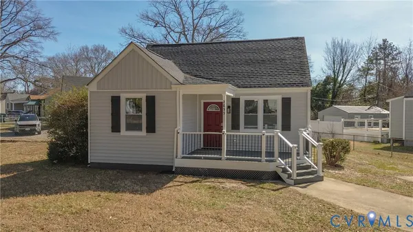 front view of a house with a yard