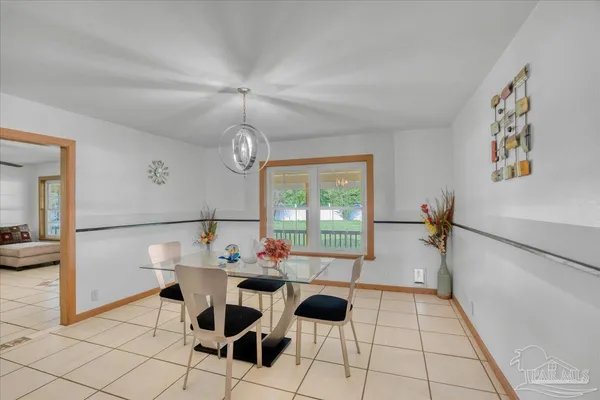 a kitchen with stainless steel appliances kitchen island granite countertop a sink and cabinets