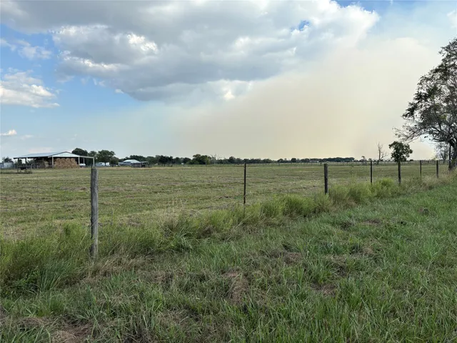 a view of a lake with a big yard