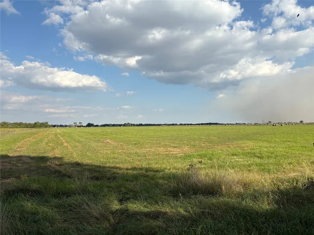 a view of an ocean and city