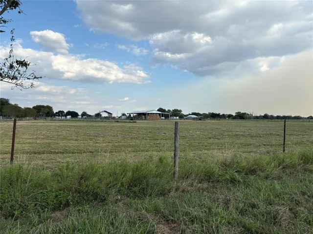 a view of a golf course with a lake