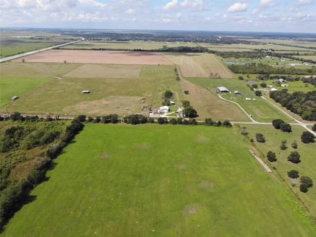 a view of a lake with a big yard