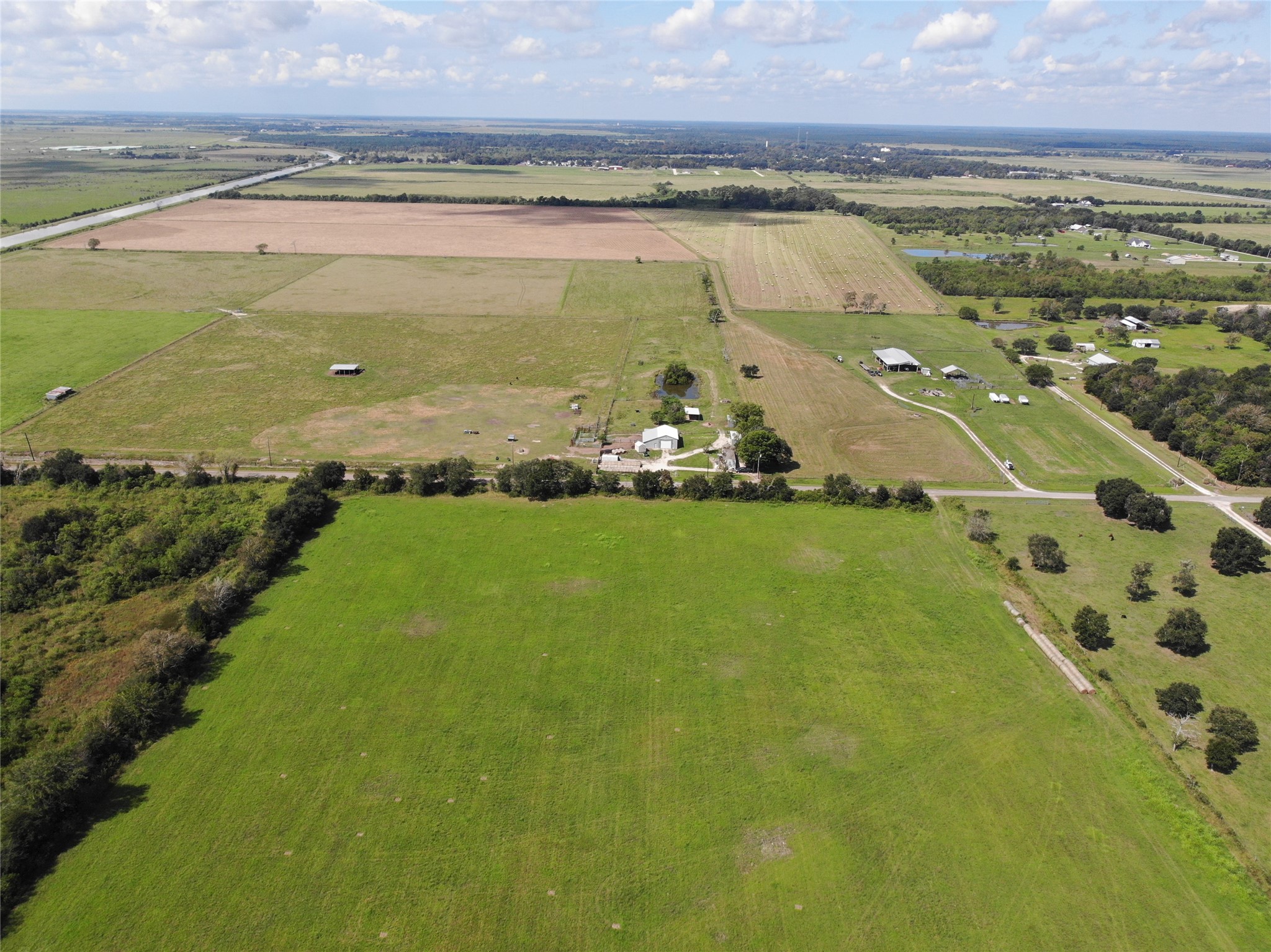 4282 Thompson Road Nome, TX 77629 - Photo 3 of 30 a view of a lake with a big yard