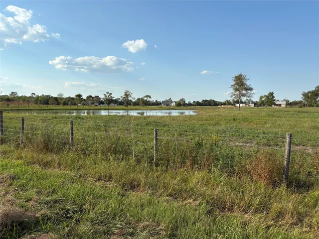 a view of a lake from a yard
