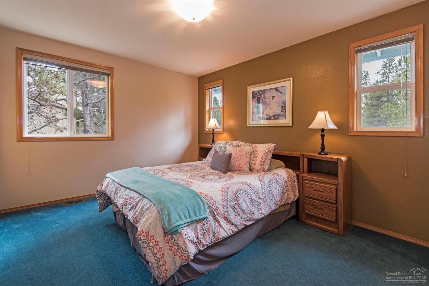 58043 Kinglet Road Sunriver, OR 97707 - Photo 8 of 18 One of three master suites upstairs, thi