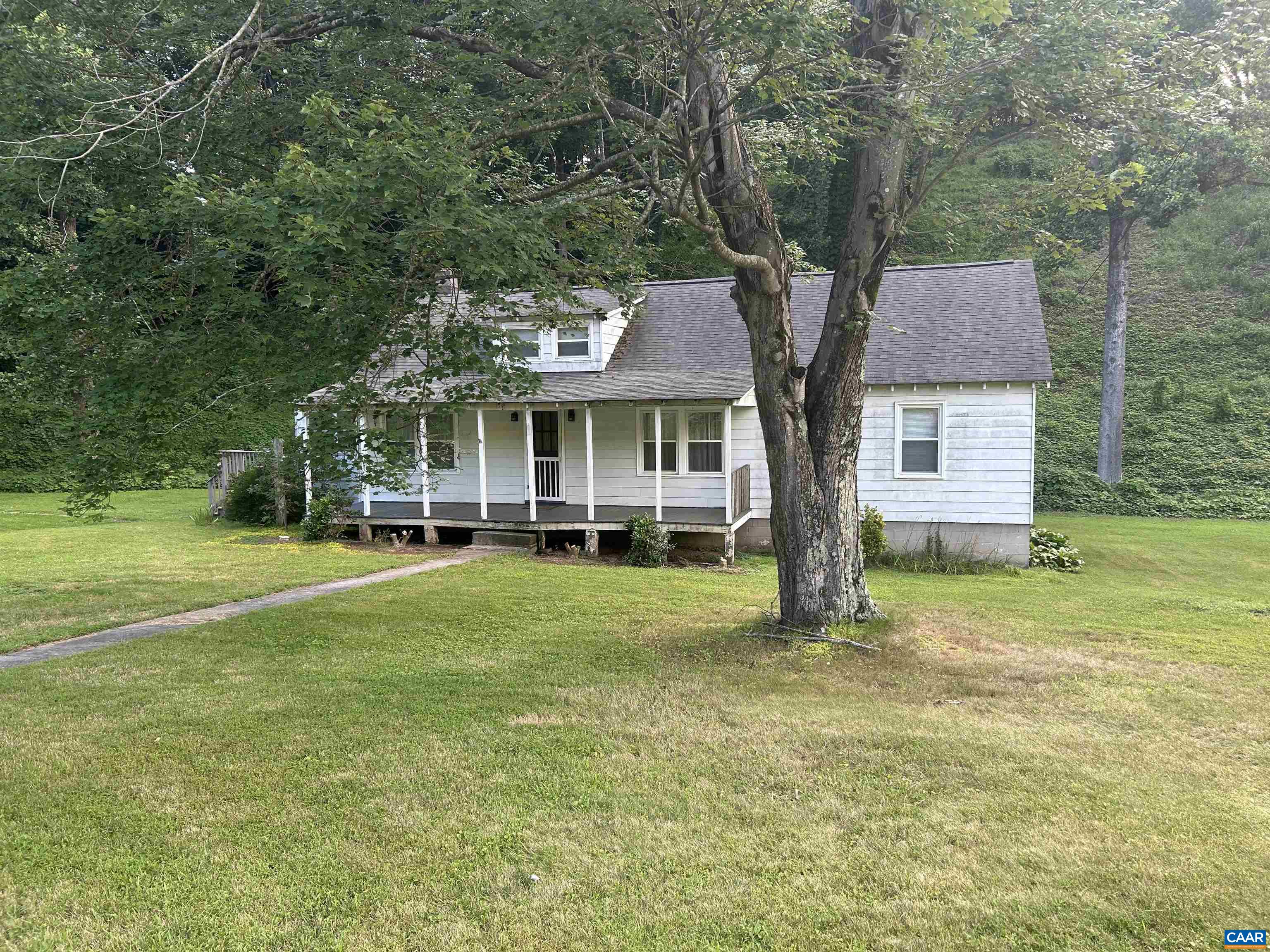 a house view with a garden space