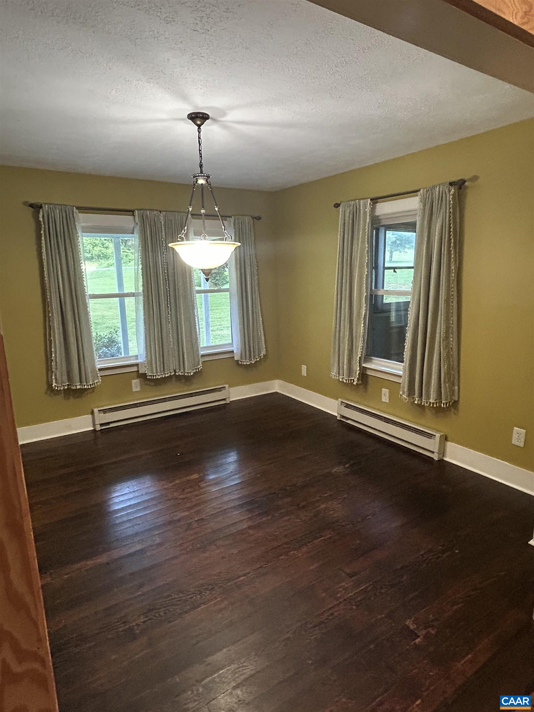 1863 River Road Faber, VA 22938 - Photo 12 of 44 an empty room with wooden floor and windows
