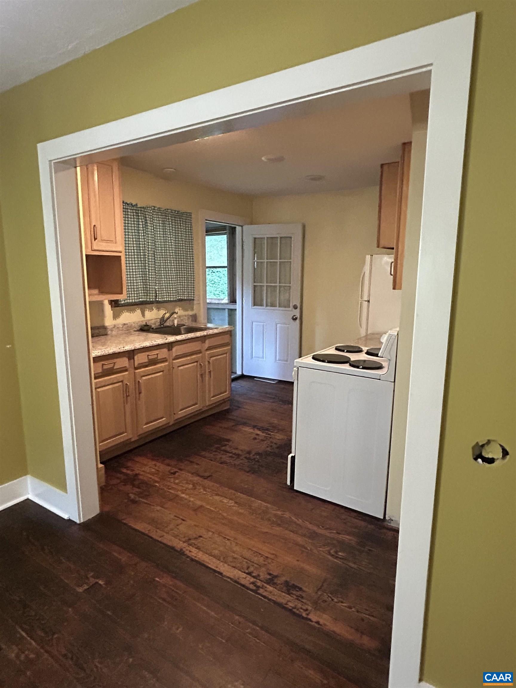 1863 River Road Faber, VA 22938 - Photo 13 of 44 a kitchen with a stove a refrigerator and a stove
