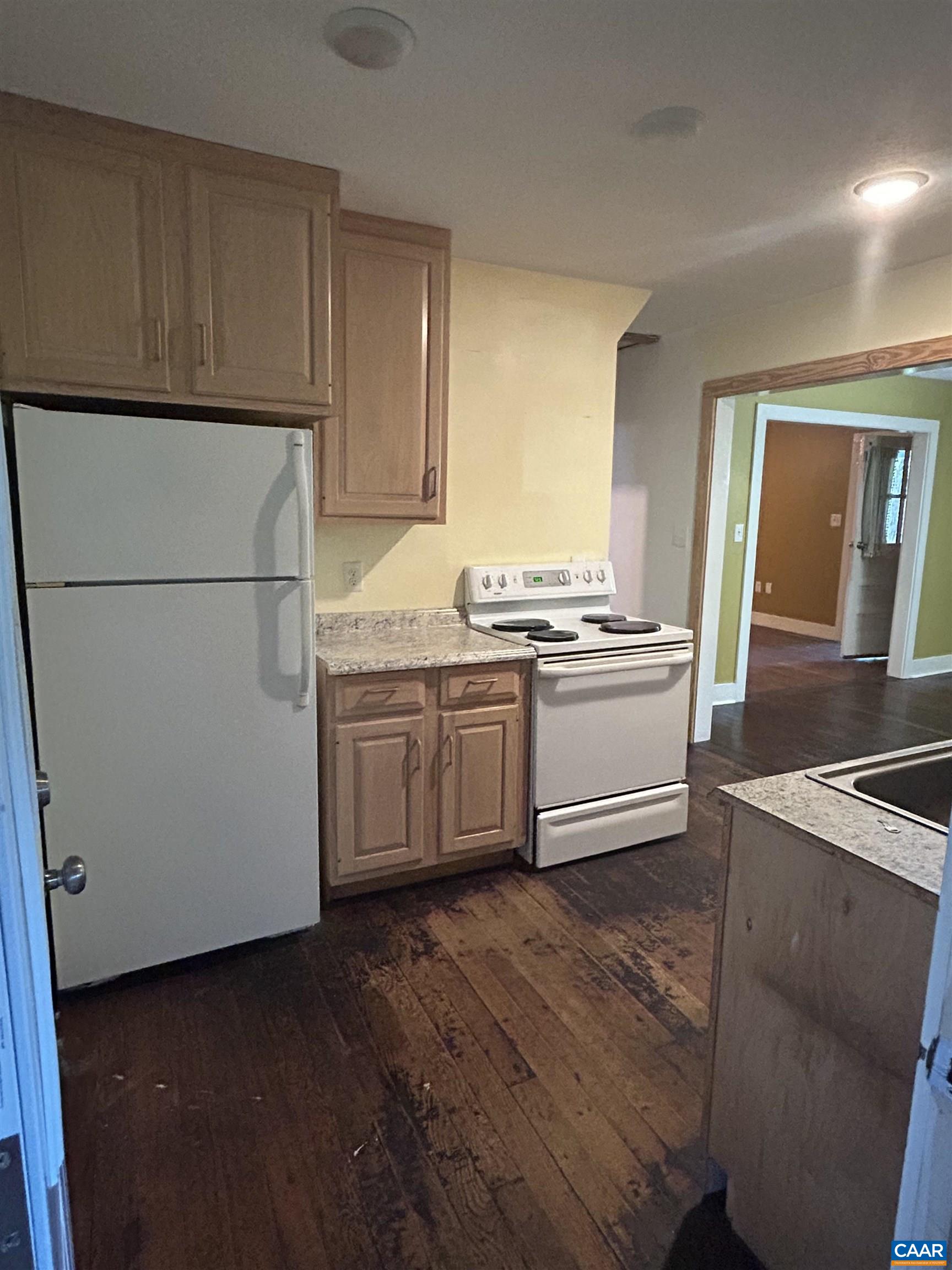 1863 River Road Faber, VA 22938 - Photo 14 of 44 a kitchen with stainless steel appliances granite countertop a stove a sink and a refrigerator