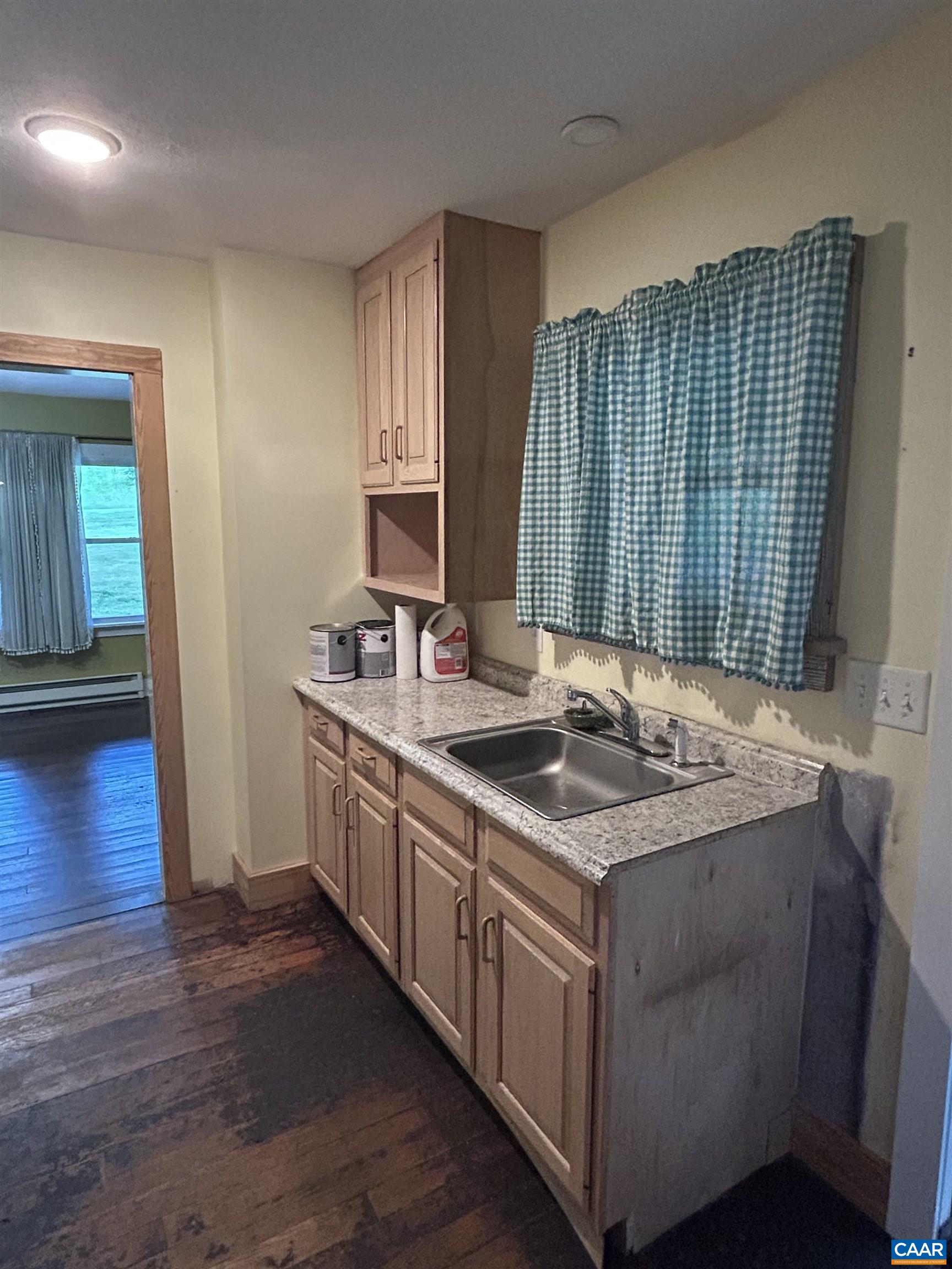 1863 River Road Faber, VA 22938 - Photo 15 of 44 a kitchen with a sink stove and cabinets