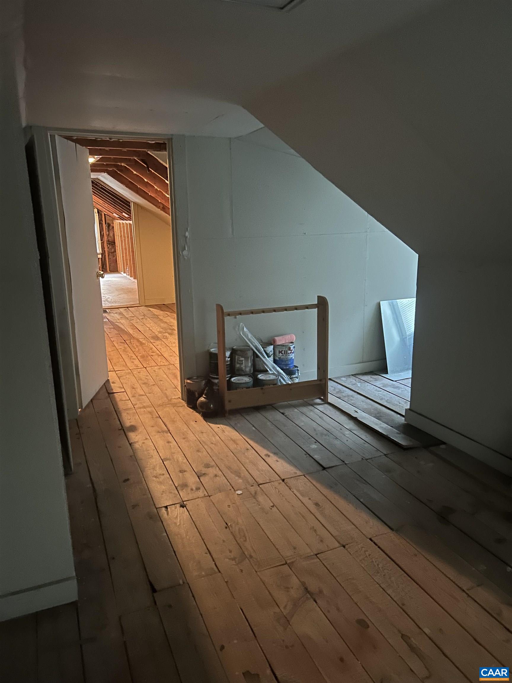 1863 River Road Faber, VA 22938 - Photo 32 of 44 a bedroom with a bed and wooden floor