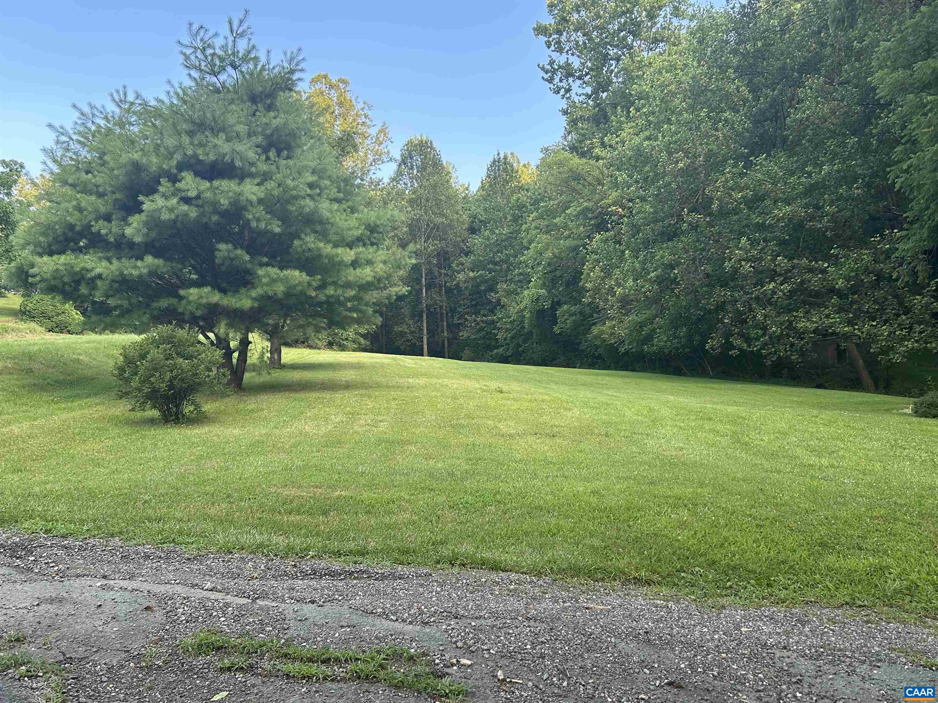 1863 River Road Faber, VA 22938 - Photo 42 of 44 a view of a field with a trees in the background