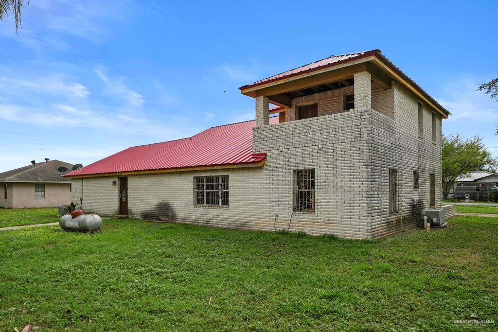 7708 Alberto Road Edinburg, TX 78542 - Photo 4 of 17 a front view of house with yard and trees