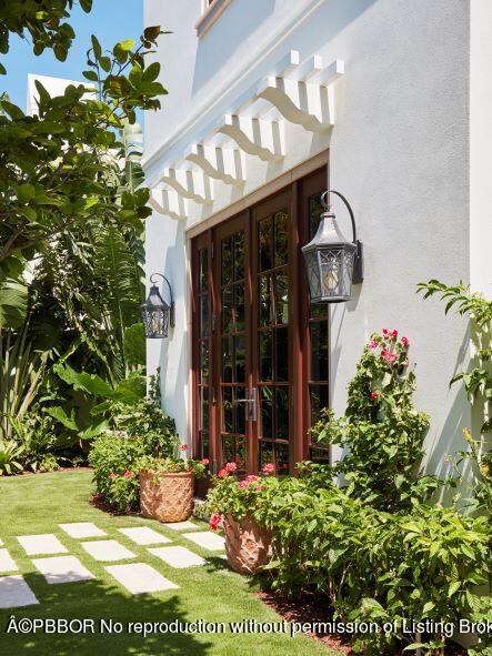 300 Indian Road Palm Beach, FL 33480 - Photo 16 of 42 a view of a house with potted plants