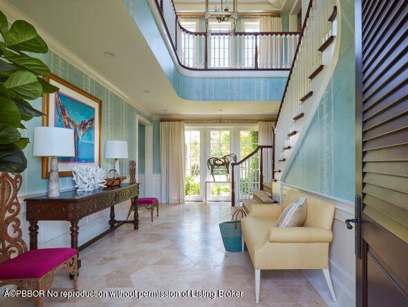 300 Indian Road Palm Beach, FL 33480 - Photo 2 of 42 a living room with furniture and a chandelier