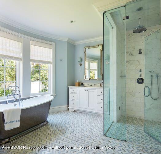 300 Indian Road Palm Beach, FL 33480 - Photo 25 of 42 a spacious bathroom with a double vanity sink bathtub and shower