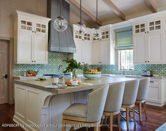 300 Indian Road Palm Beach, FL 33480 - Photo 6 of 42 a view of a dining room with furniture window and wooden floor