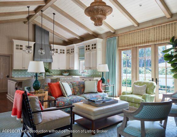 300 Indian Road Palm Beach, FL 33480 - Photo 8 of 42 a living room with furniture and a large window