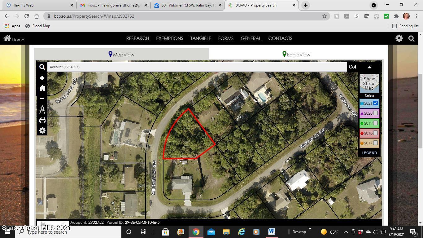 501 Wildmer Road Southwest Palm Bay, FL 32908 - Photo 1 of 12 a picture of a painting on a wall