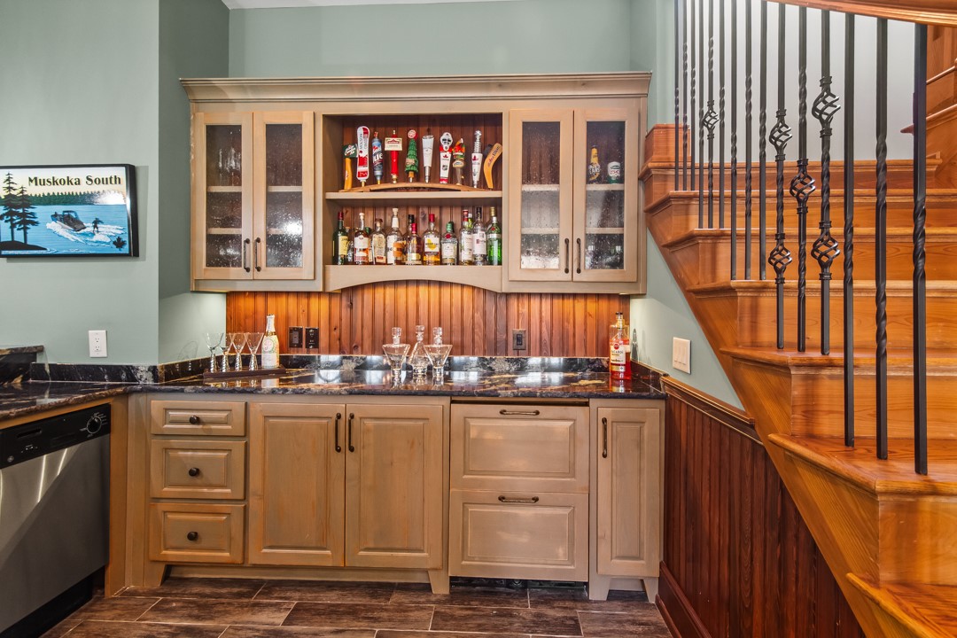 206 Feather Bell Lane Sunset, SC 29685 - Photo 33 of 50 This interior features a full bar area with ample storage and ice maker.