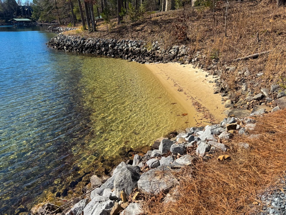 206 Feather Bell Lane Sunset, SC 29685 - Photo 43 of 50 This serene lakefront property offers a private sandy beach and clear, tranquil waters.