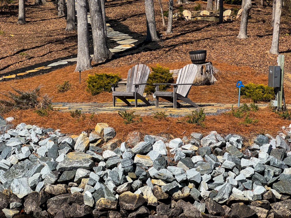 206 Feather Bell Lane Sunset, SC 29685 - Photo 45 of 50 This waterfront retreat offers a charming pathway leading to peaceful seating and your boat.