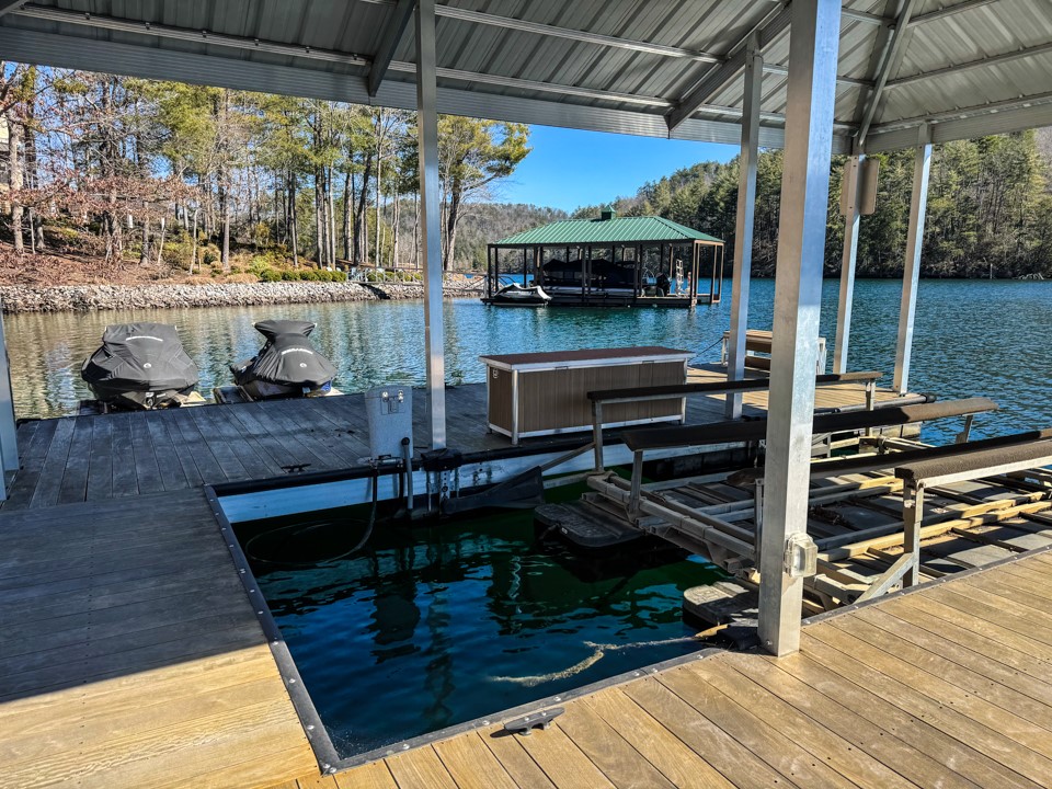 206 Feather Bell Lane Sunset, SC 29685 - Photo 47 of 50 This tranquil waterfront retreat offers a private covered dock to protect your boat.