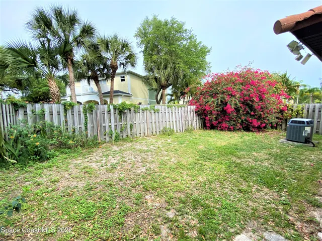 a view of a house with a garden