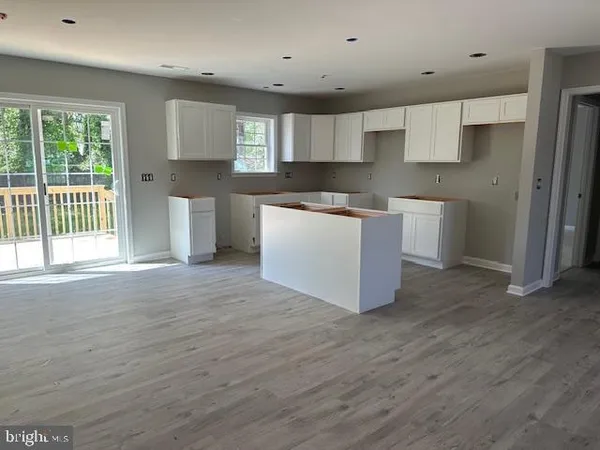 wooden floor and window in a room