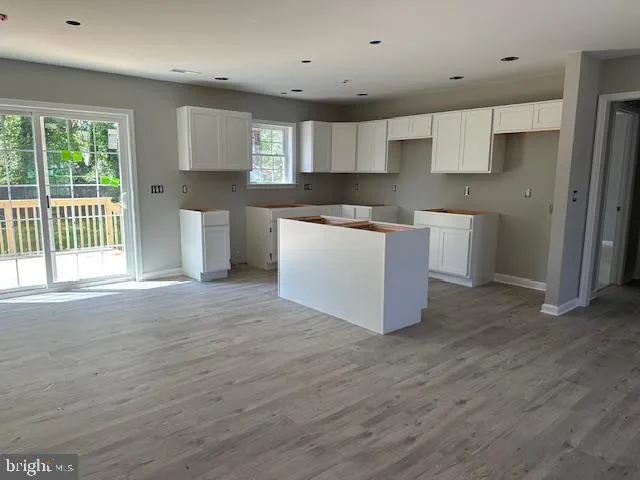 wooden floor and window in a room
