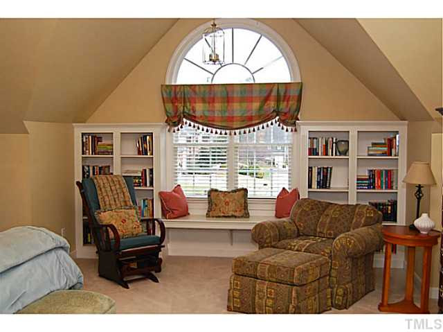 4019 Heathgate Lane Raleigh, NC 27613 - Photo 13 of 24 10 ft ceiling, built-in bookcases & window bench. Master Bedroom