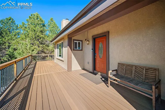 a view of a livingroom with furniture and hardwood floor