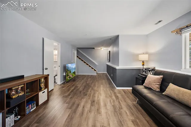 a bathroom with a sink a mirror and vanity