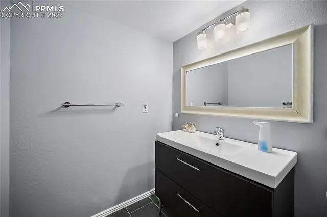 a view of balcony with wooden floor and fence