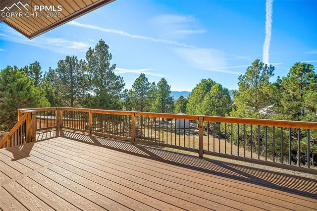 a balcony with wooden floor