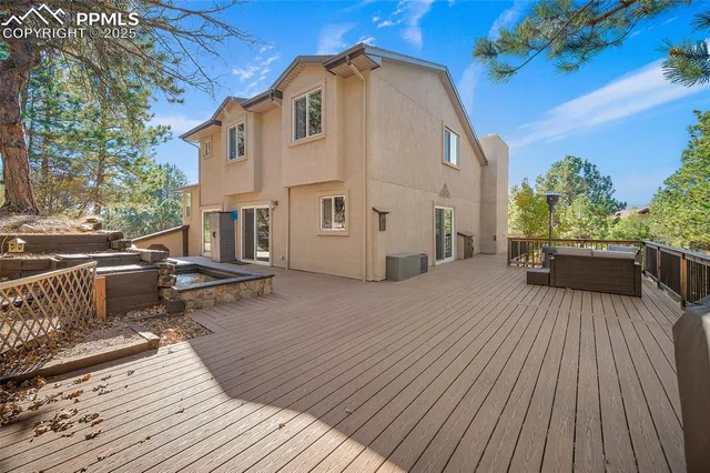 a view of a house with a snow on the road