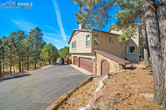an aerial view of residential house with outdoor space and river