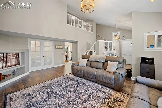 a view of a living room and dining room
