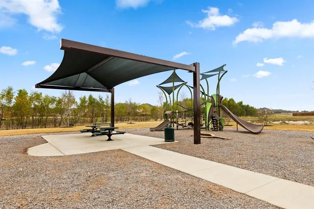 a view of a park with a slide
