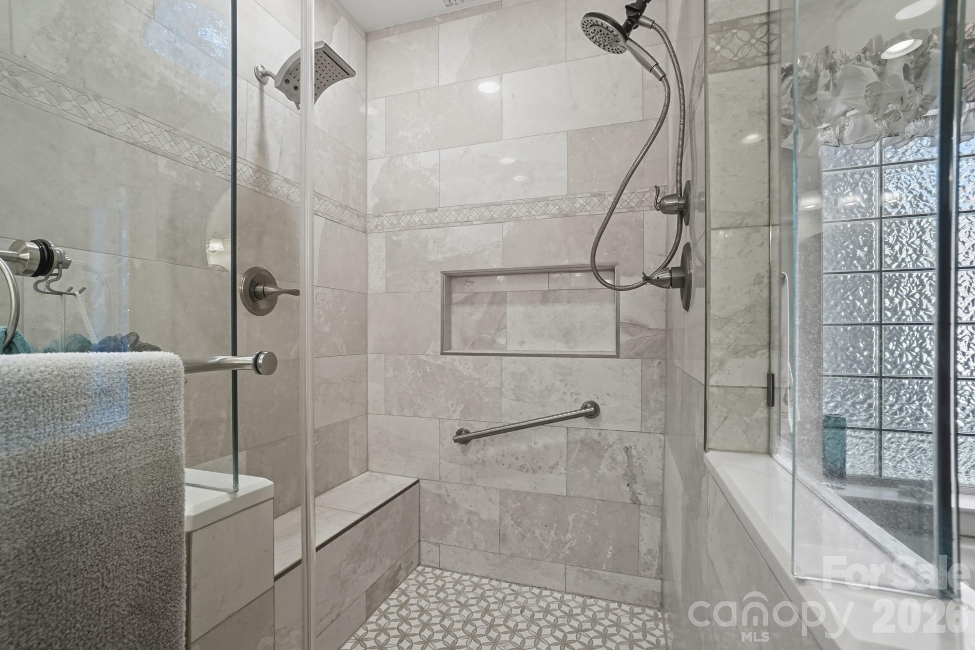 8629 Hayden Way Concord, NC 28025 - Photo 24 of 39 a bathroom with a shower