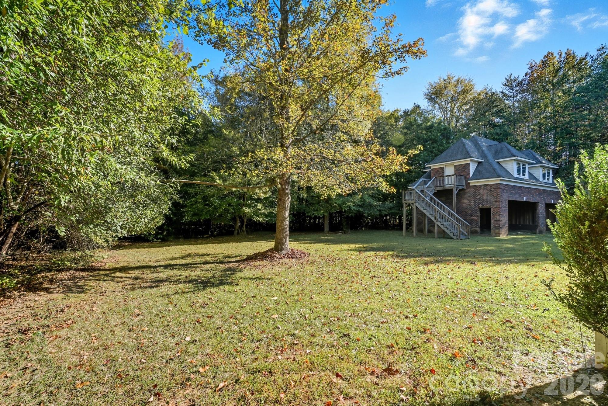8629 Hayden Way Concord, NC 28025 - Photo 33 of 39 a front view of a house with a yard