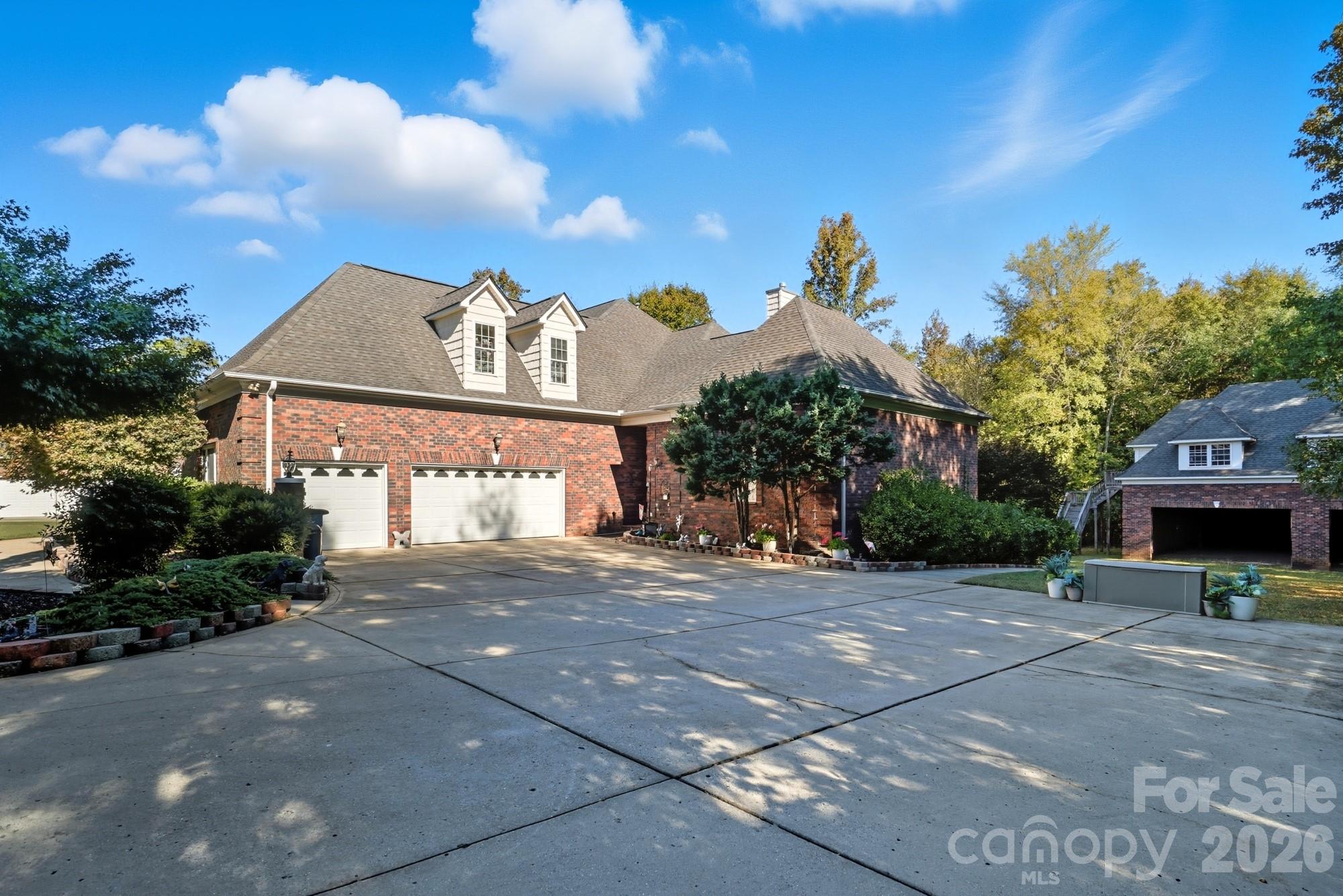 8629 Hayden Way Concord, NC 28025 - Photo 34 of 39 a view of a house with a yard