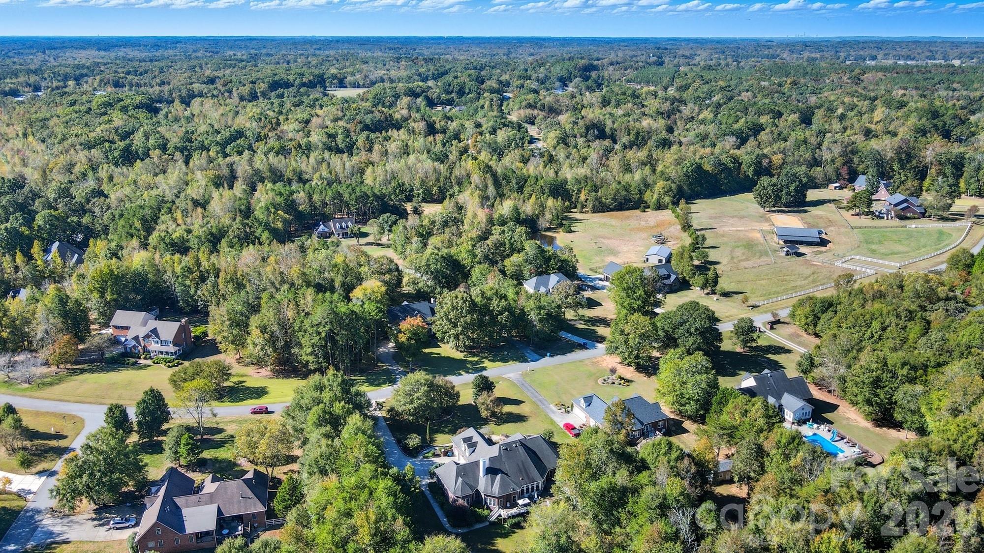 8629 Hayden Way Concord, NC 28025 - Photo 36 of 39 an aerial view of a house with a yard
