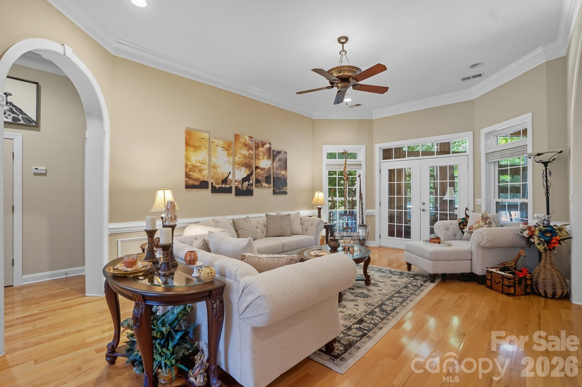 8629 Hayden Way Concord, NC 28025 - Photo 5 of 39 a living room with furniture and a wooden floor