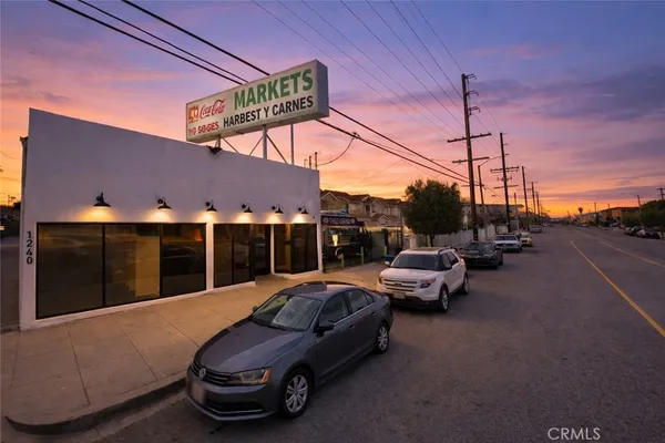 a view of a street with cars