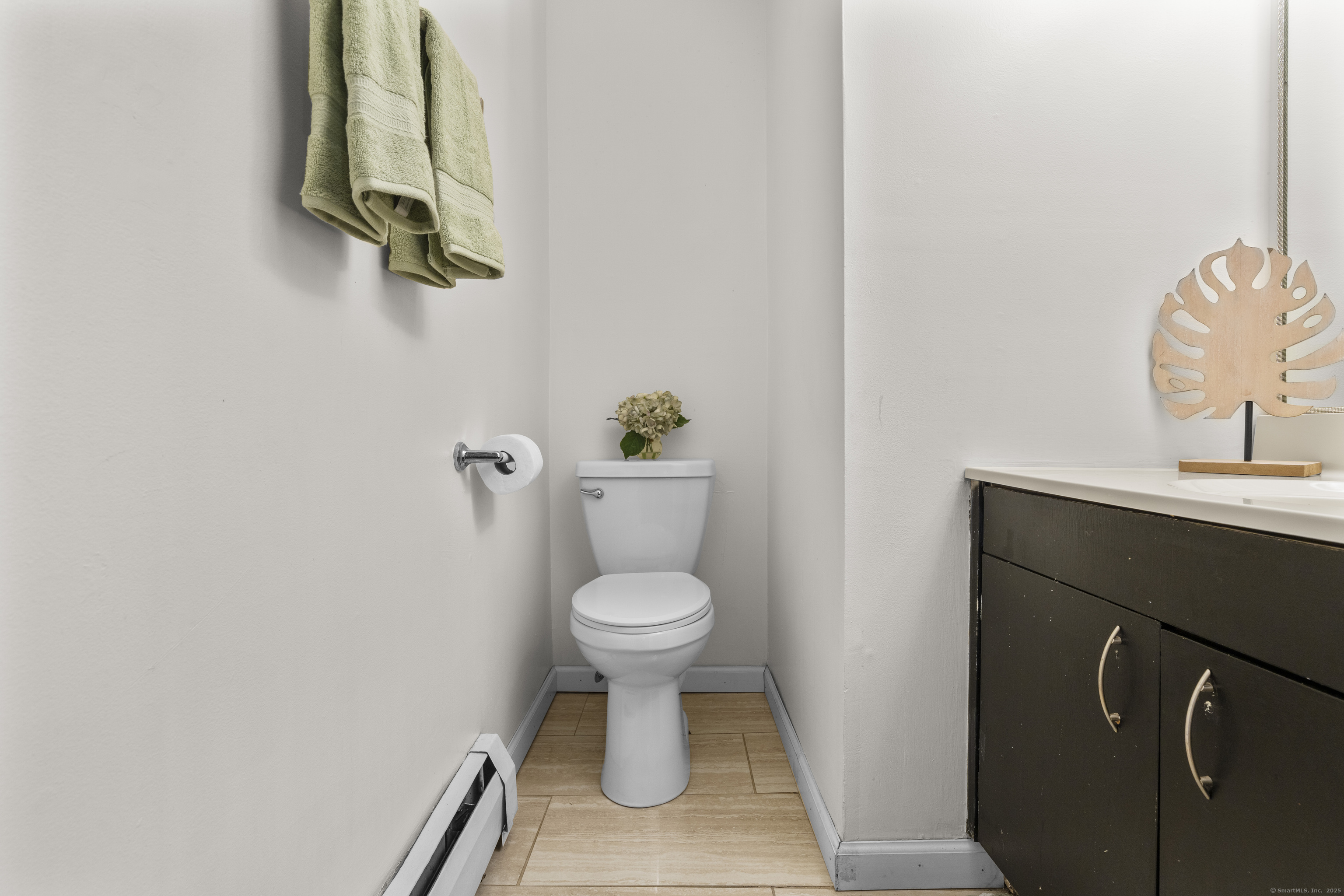 203 Kaynor Drive, Unit B Waterbury, CT 06708 - Photo 16 of 36 a bathroom with a toilet and a sink